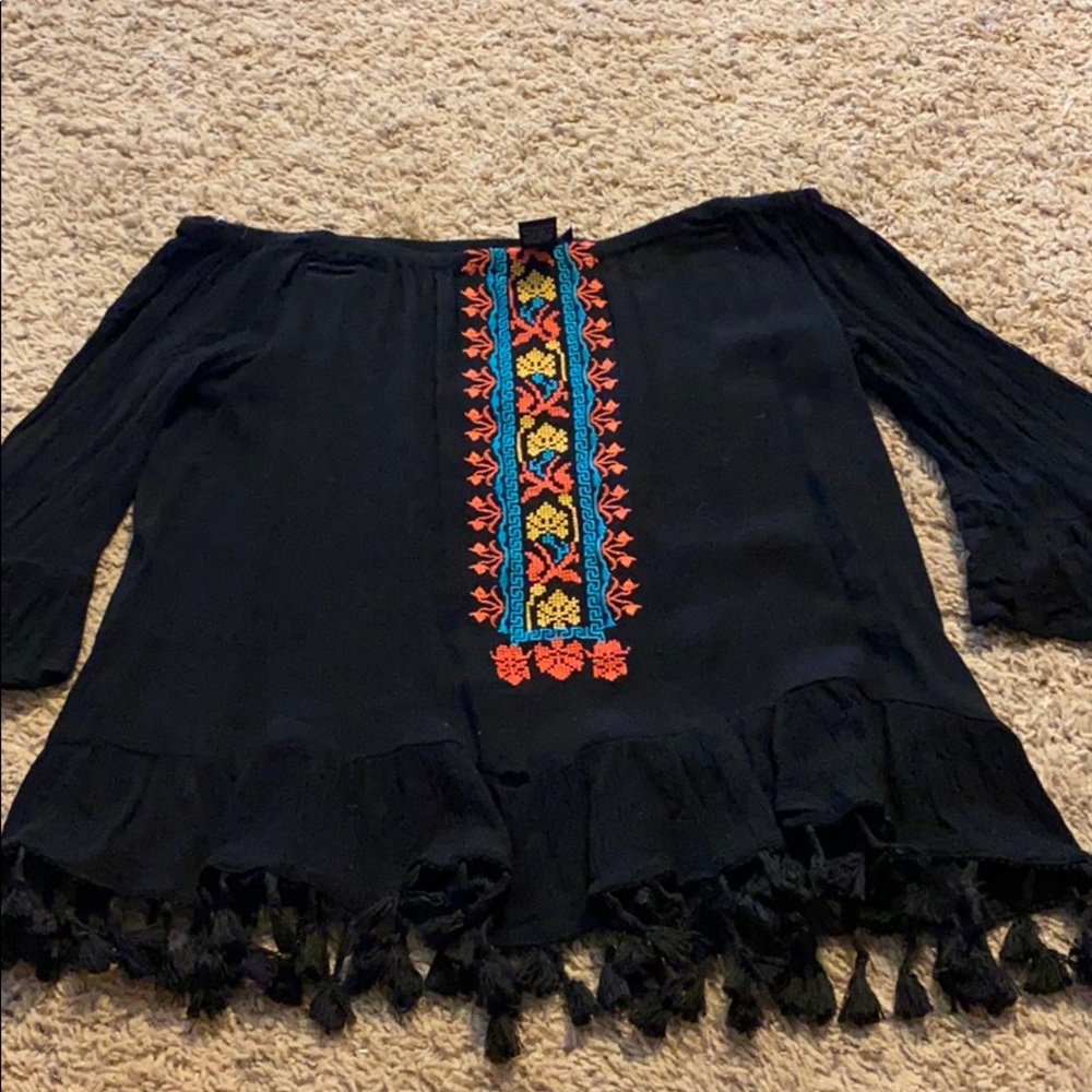 off the shoulder top with tassel bottom